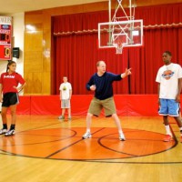 Photo of Coach Lawrence Frank and Hoop Dreamz campers